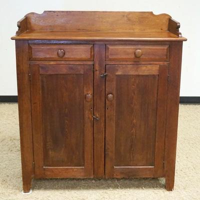 1023	PRIMITIVE PINE 2 DOOR 2 DRAWER JAM/JELLY CUPBOARD, APPROXIMATELY 45 IN X 17 IN 51 IN HIGH
