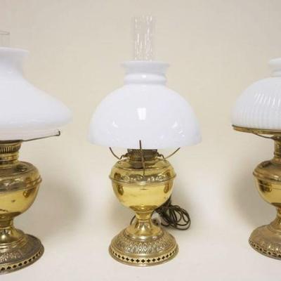1063	LOT OF 3 BRASS ELECTRIFIED RAYO STYLE LAMPS, TALLEST APPROXIMATELY 21 IN HIGH
