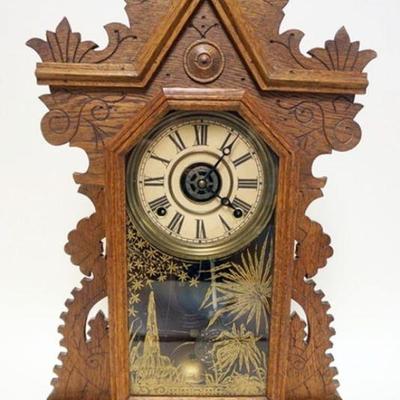 1167	VICTORIAN INGRAHAM GINGERBREAD KITCHEN CLOCK, APPROXIMATELY 22 1/2 H

