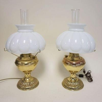 1064	2 BRASS RAYO STYLE LAMPS W/RIBBED SHADES, BOTH ELECTRIFIED, APPROXIMATELY 21 IN HIGH

