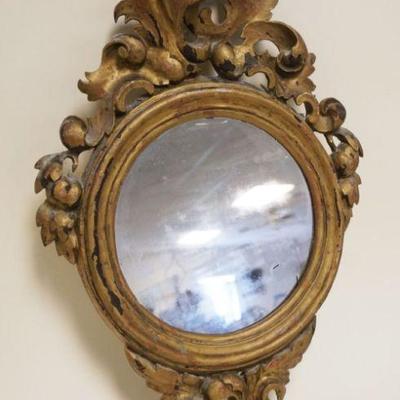 1058	ANTIQUE GOLD FINISHED WOOD SCROLLED MIRROR, APPROXIMATELY 23 IN HIGH
