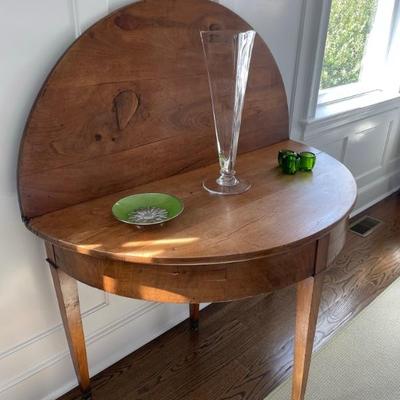 Antique French demi lune table from Village Francais