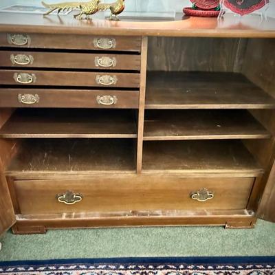 Custom-made in Japan late 40s/early 50s buffet with brass trim and four flatware drawers. Brass lock. 