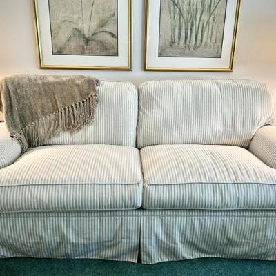 Tan and white striped coastal-style sofa (sofa, armchair, and two chairs are all recently upholstered in coordinating fabric, and in...