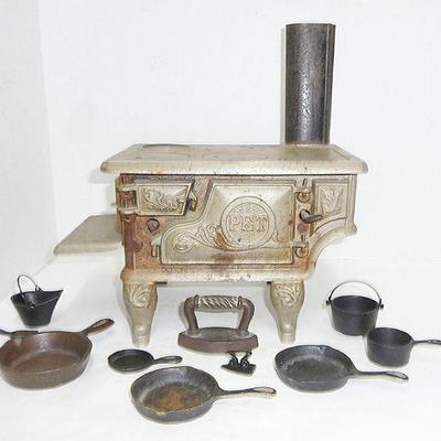 Miniature iron stove w/access