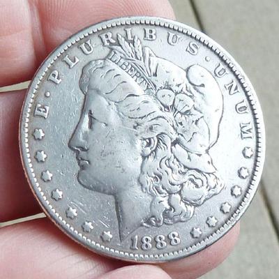 several silver coins, coins