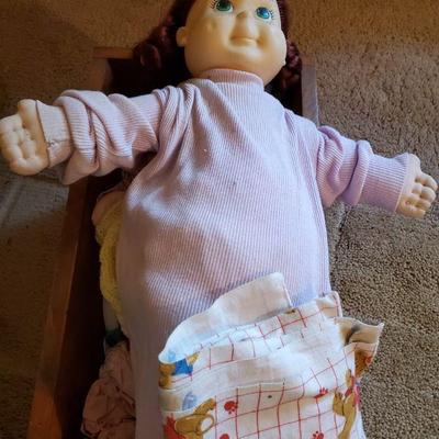 Cradle (19.5Ã—11.5Ã—11"), Dolls (22", 15") and Clothes
