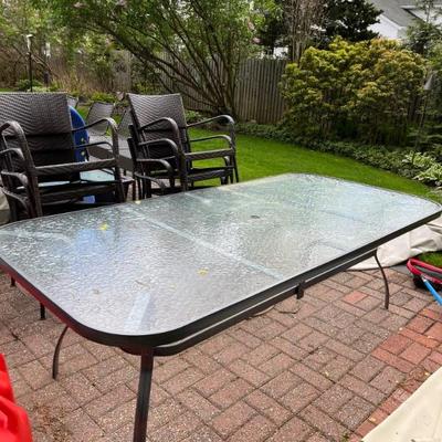Large outdoor glass table like new 
