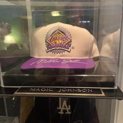 Lakers hat signed by Magic Johnson