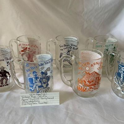 set of 7 - glass mugs - with sheet music print
