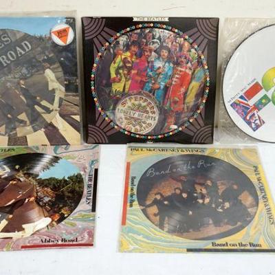 1012	LOT OF BEATLES/MCCARTNEY & HARRISON PICTURE DISCS INCLUDES 2 PICTURE DISCS FOR ABBEY ROAD, SGT PEPPERS, PAUL MCCARTNEY & WINGS BAND...
