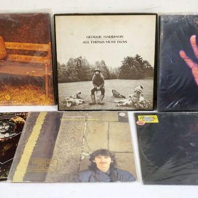 1024	LOT OF GEORGE HARRISON VINYL ALBUMS INCLUDES ALL THINGS MUST PASS, DARKHORSE, LIVING IN THE MATERIAL WORLD, LIVE IN JAPAN, SOMEWHERE...