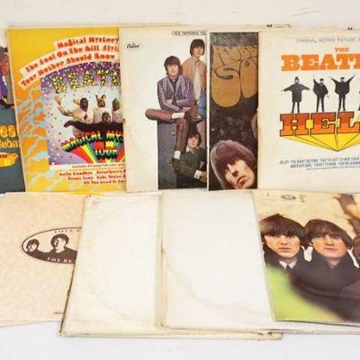 1027	LOT OF BEATLES VINYL ALBUMS W/WEAR/DAMAGE, AS FOUND, SOME RECORDS MISSING COVERS INCLUDES BEATLES LOVE SONGS COLOR VINYL MISSING COVER
