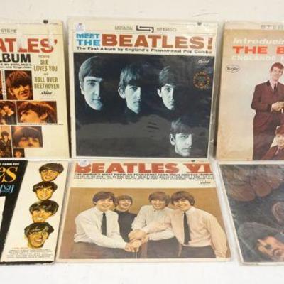 1008	LOT OF 6 BEATLES VINYL ALBUMS INCLUDES INTRODUCING THE BEATLES, MEET THE BEATLES, RUBBER SOUL, BEATLES VI, SONGS PICTURES & STORIES...