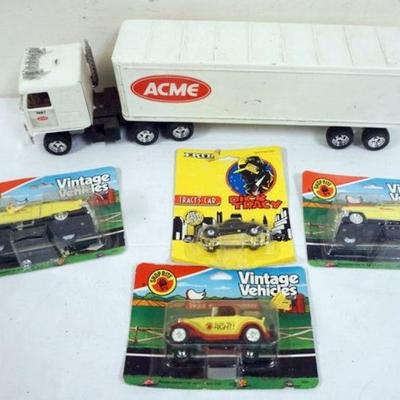 1088	TOY LOT INCLUDING ACME PRESSED STEEL TRACTOR TRAILER AND ERTLE DICK TRACY AND SHOP RITE. VINTAGE CARS
