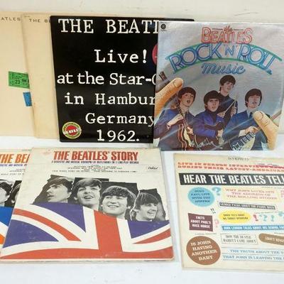 1016	LOT OF VINYL BEATLES ALBUMS INCLUDES THE BEATLES AT HOLLYWOOD BOWL, LIVE AT HAMBURG, BEATLES ROCK & ROLL MUSIC, THE BEATLES...