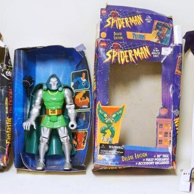 1179	TWO VINTAGE 1994 TOY BIZ  MARVEL COMICS 10 IN ACTION FIGURES W/ PACKAGING (PACKAGING HAS WEAR) LOT INCLUDES FANTASTIC FOUR DR. DOOM...