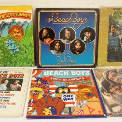 1036	LOT OF 6 BEACH BOYS/THE MONKEES VINYL ALBUMS INCLUDES, ENDLESS SUMMERS W/2 POSTERS, BEST OF THE BEACH BOYS, SPIRIT OF AMERICA, 15...