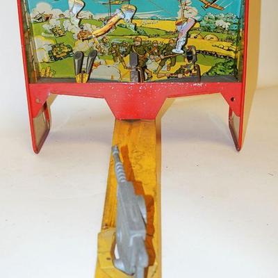 1173	MARX WWII ERA TIN LITHO NATIONAL DEFENSE TARGET PRACTICE ARCADE  TYPE TOY. HAS SOME PAINT LOSS. APP. 22 IN X 11 IN H X 12 1/2 IN W. 
