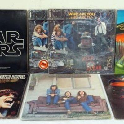 1042	LOT OF 7 VINYL ALBUMS INCLUDES STAR WARS SOUNDTRACK, THE WHO WHO ARE YOU PICTURE DISC 7 COLOR VINYL, BOSTON DONâ€™T LOOK BACK & SELF...