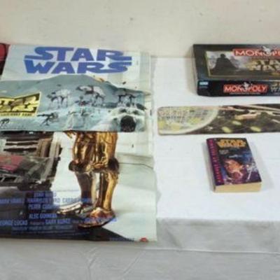 1082	STAR WARS LOT INCLUDING PIZZA HUT POSTERS, MONOPOLY GAME AND LUNCH BOX. BOX HAS DENT IN UPPER LEFT CORNER
