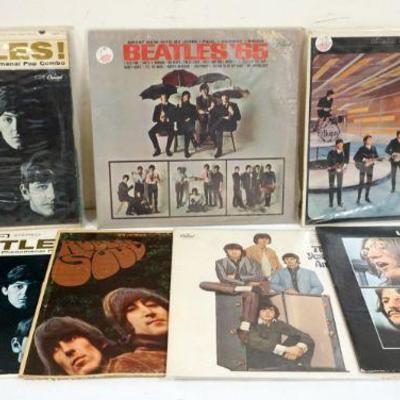 1011	LOT OF 7 VINYL BEATLES ALBUMS INCLUDES BOTH MONO & STEREO VERSIONS OF MEET THE BEATLES, THE BEATLES YESTERDAY & TODAY, LET IT BE,...