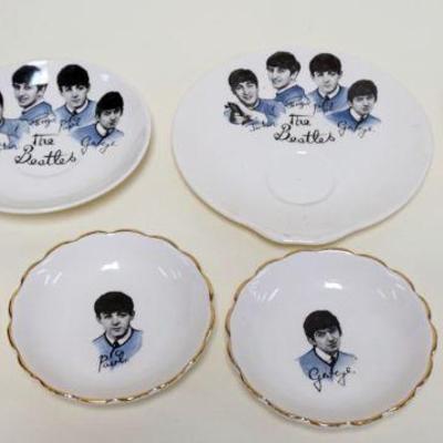 1003	THE BEATLES WASHINGTON POTTERY 1964 CUP & SAUCERS, CUP HAS HAIR LINE
