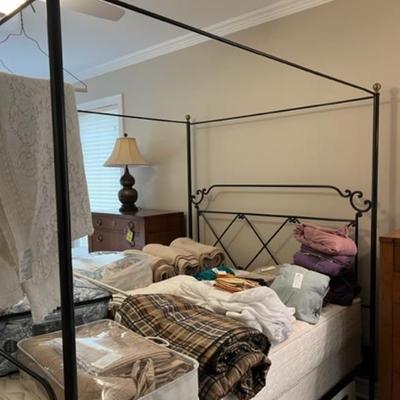 Four poster iron bed