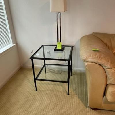 Metal rimmed glass table and lamp