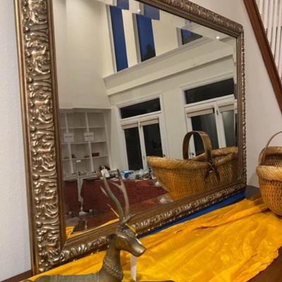 Beveled glass mirror is beautiful gold frame