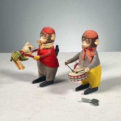 (2PC) ANTIQUE MONKEY WIND-UP TOYS | Including a functional drummer boy and a monkey swinging a child, metal and cloth.