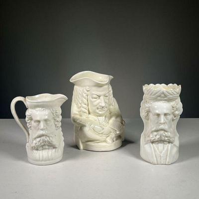 (3PC) WHITE WEDGWOOD & OTHER MUGS | Toby jugs, includes a Wedgwood Creamware figural mug titled â€œThe Elizu Tobyâ€ and 2 Toby-like...