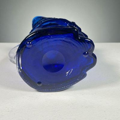 BLUE BLOWN GLASS TOBY | An unusual blue blown glass Toby jug with clear glass applied handle.