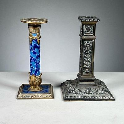 (2PC) INTERESTING BRASS CANDLESTICKS | Includes: a blue enameled and brass candlestick with floral motif in the base, and one intricately...