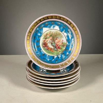 (6PC) ALLEGORICAL AUSTRIAN PLATES | A set of six hand painted plates showing women in various allegorical nature scenes, with blue and...