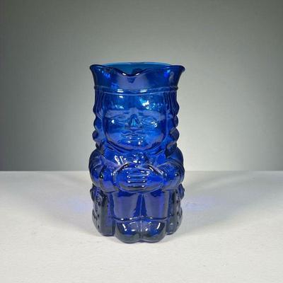 BLUE BLOWN GLASS TOBY | An unusual blue blown glass Toby jug with clear glass applied handle.