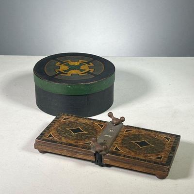 (2PC) WOODEN BOOK PRESS & SMALL BOX | A faux grain / inlay painted wooden book press and a small round lidded box painted with Celtic...