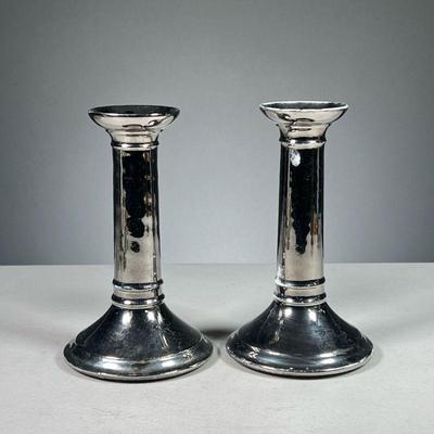 (2PC) PAIR MERCURY GLASS CANDLESTICKS | Ceramic candlesticks with a silver mirror finish. Dimensions: h. 7 x dia. 4 in