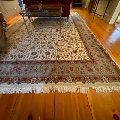 Rug is 9.5 ft by 14 ft