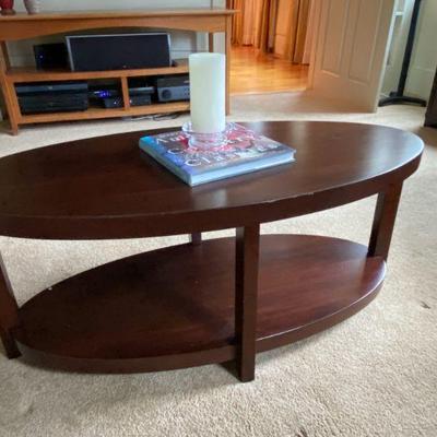 Oval coffee table is 44