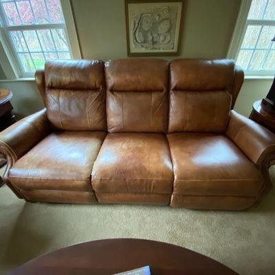 Leather couch in excellent shape is 7 ft long.
