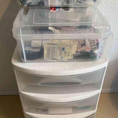 Organizing drawers with sewing notions and supplies
