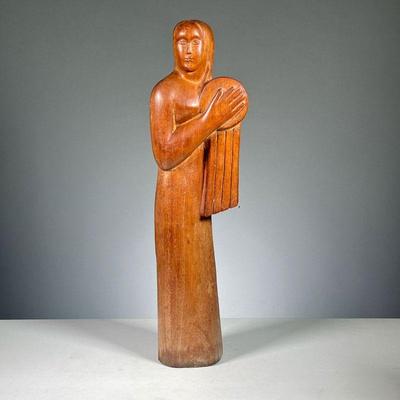 ATTRIB. LINTON (20TH CENTURY) | female figure with drum modernist carving depicting a woman holding a drum.