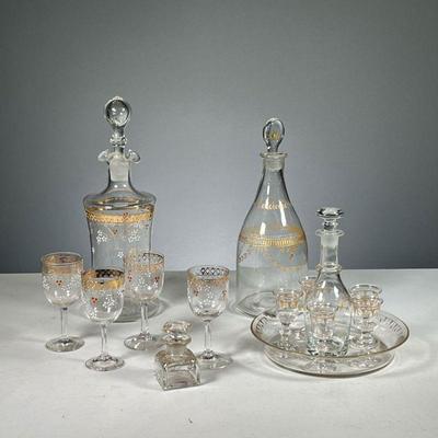 (14PC) GILT GLASS DRINKING SET | Includes: 9 gilt cordial glasses with floral decoration, gilt glass tray, small gilt glass jar with...
