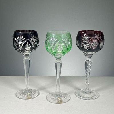 (3PC) COLOR HOCK GLASSES | Cut glass and colored, including 2 red wine glasses, cut and etched with various patterns and a light green...