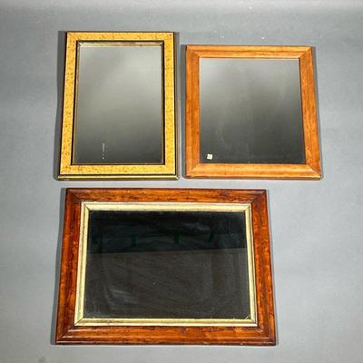 (3PC) ANTIQUE WOOD FRAME MIRRORS | Including a faux-painted birds eye maple frame mirror, a 19th century maple mirror, and a light wood...