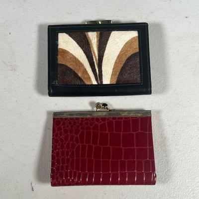 (2PC) LEATHER COIN PURSES | Includes one black coin purse with fur on side & one red leather coin purse. Dimensions: w. 4.5 x h. 3.5 in