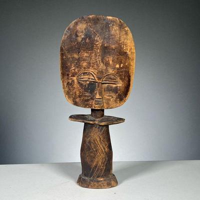 CARVED WOOD TOTEM | Hand carved wooden totem figurine.
