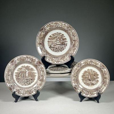 (7PC) AMERICAN MARINE DISHES | Brown and White plates decorated with naval scenes and various ports around the border. Dimensions: dia....