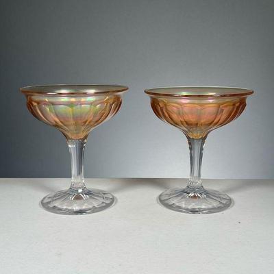 (2PC) IRRIDESCENT CHAMPAGNE GLASSES | Orange colored, cut glass, champagne or cocktail glasses Dimensions: h. 5.5 x dia. 5 in